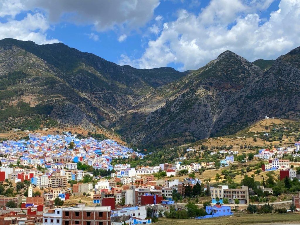 The blue Medina of Chefchaouen resting on the base of the mountains 