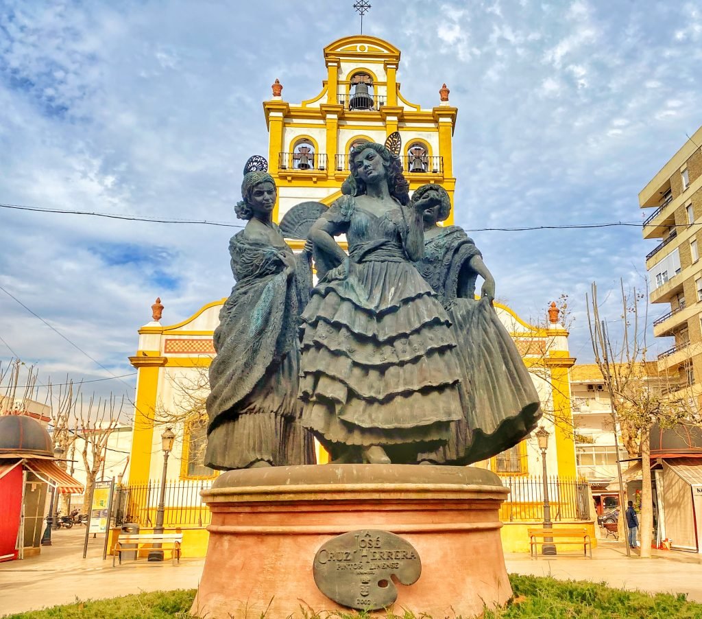 A statue in Spain of three arrogant looking women