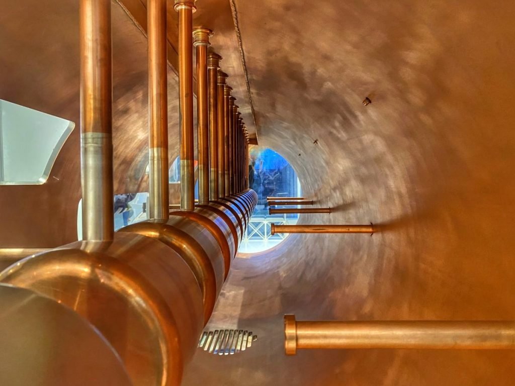 The copper linear accelerator where protons are shot through tubing that extends longer and longer.