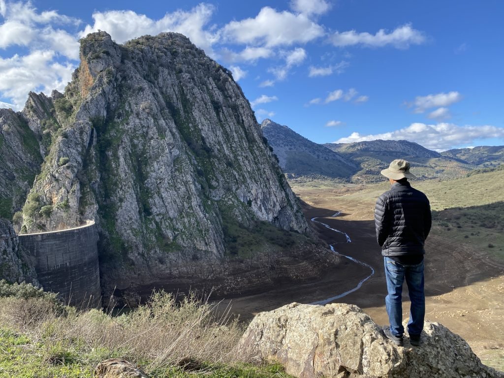 Trin looking down into the dry reservoir of Presa de Montejaque.