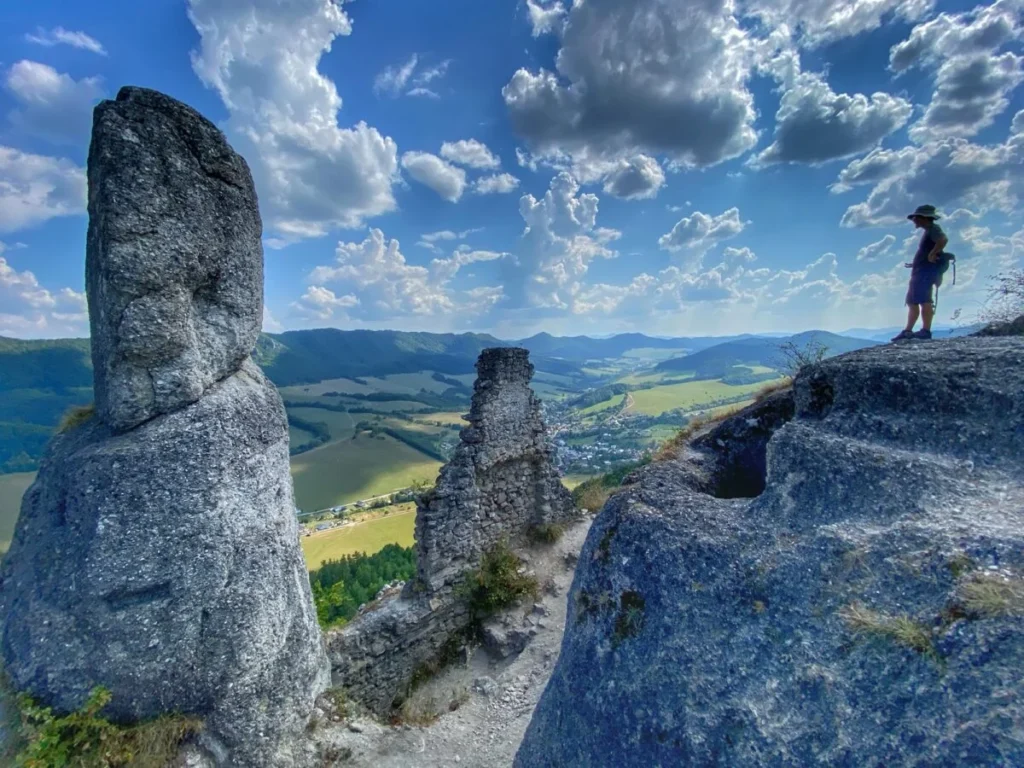 Trin on top of castle ruins at the Sulov Rocks