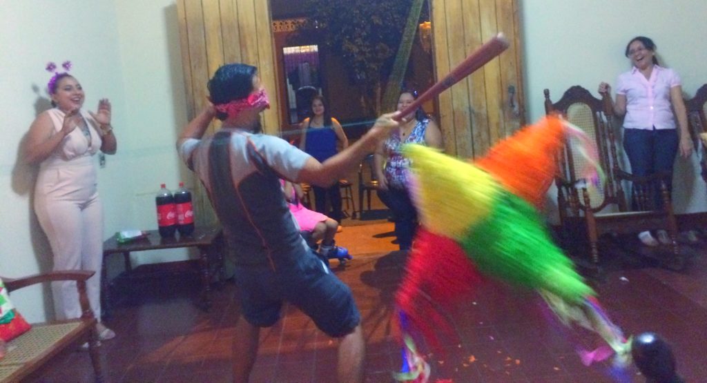 Trin trying to hit the piñata