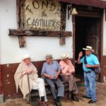 men on the sidewalk San Pedro must see Colombia