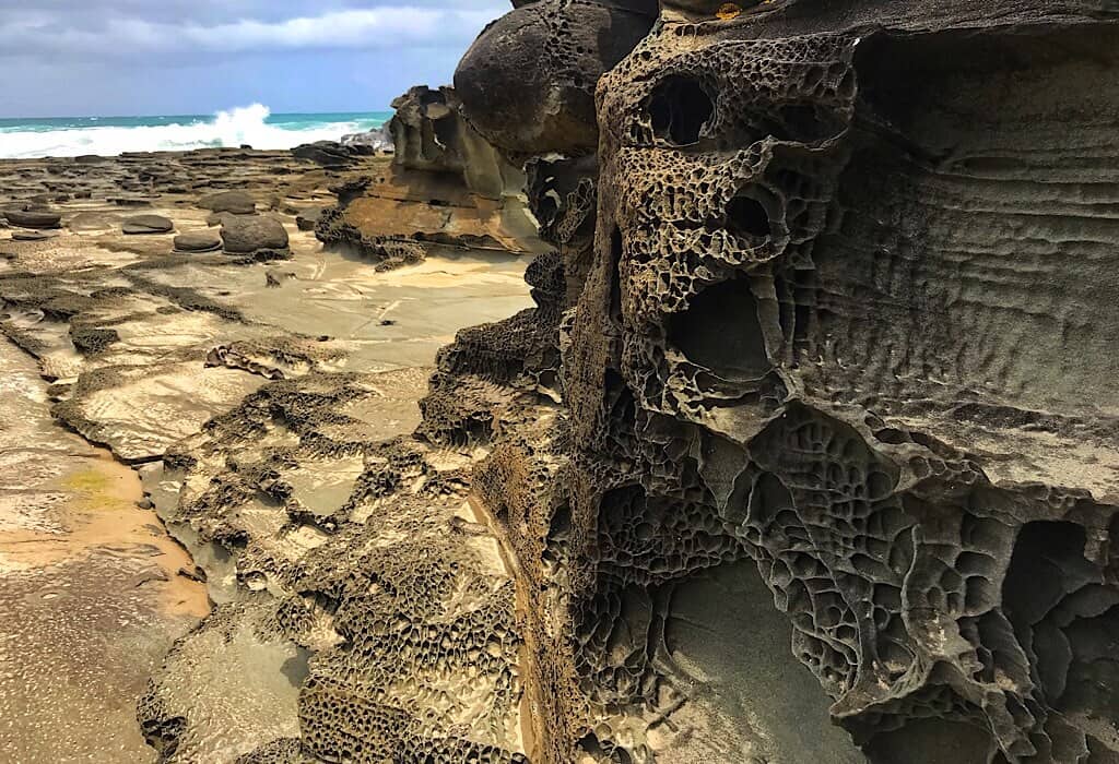 Rock formations where the Elliot River empties into the Ocean along The Great Ocean Road, Victoria, Australia