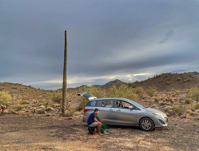 Trin making dinner at our Gold Nugget campsite near Quartzsite