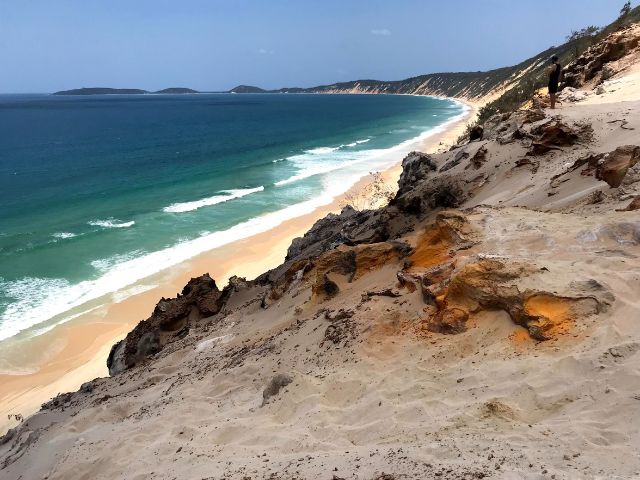 View from the top of a colorful Sand Dune looking out over the ocean