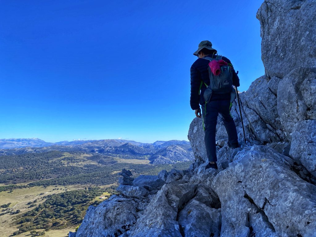 Trin on the rocky edge of the trail above Grazalema
