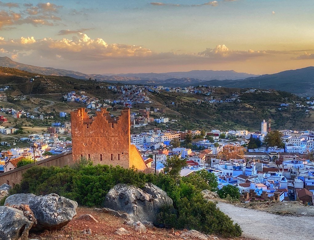 A watchtower in the old city wall above Chefchaouen at sunset