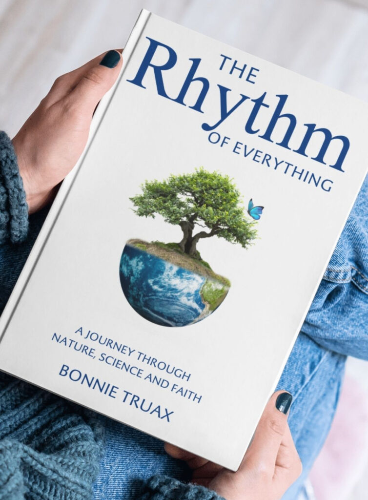 The Rhythm of Everything Book held in a lap