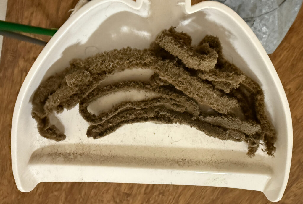 Dust from the edge of a ceiling fan. 