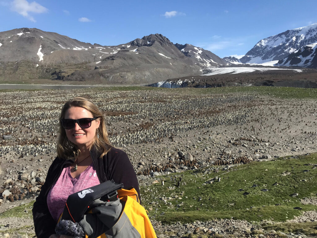Bonnie in front of a penguin colony in South Georgia