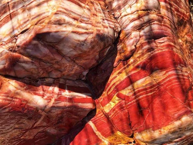 Large rocks with brilliant red Jasper